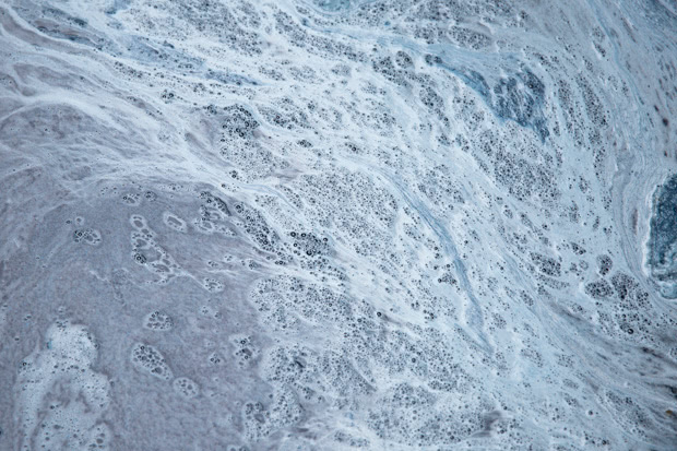 water washing over a beach